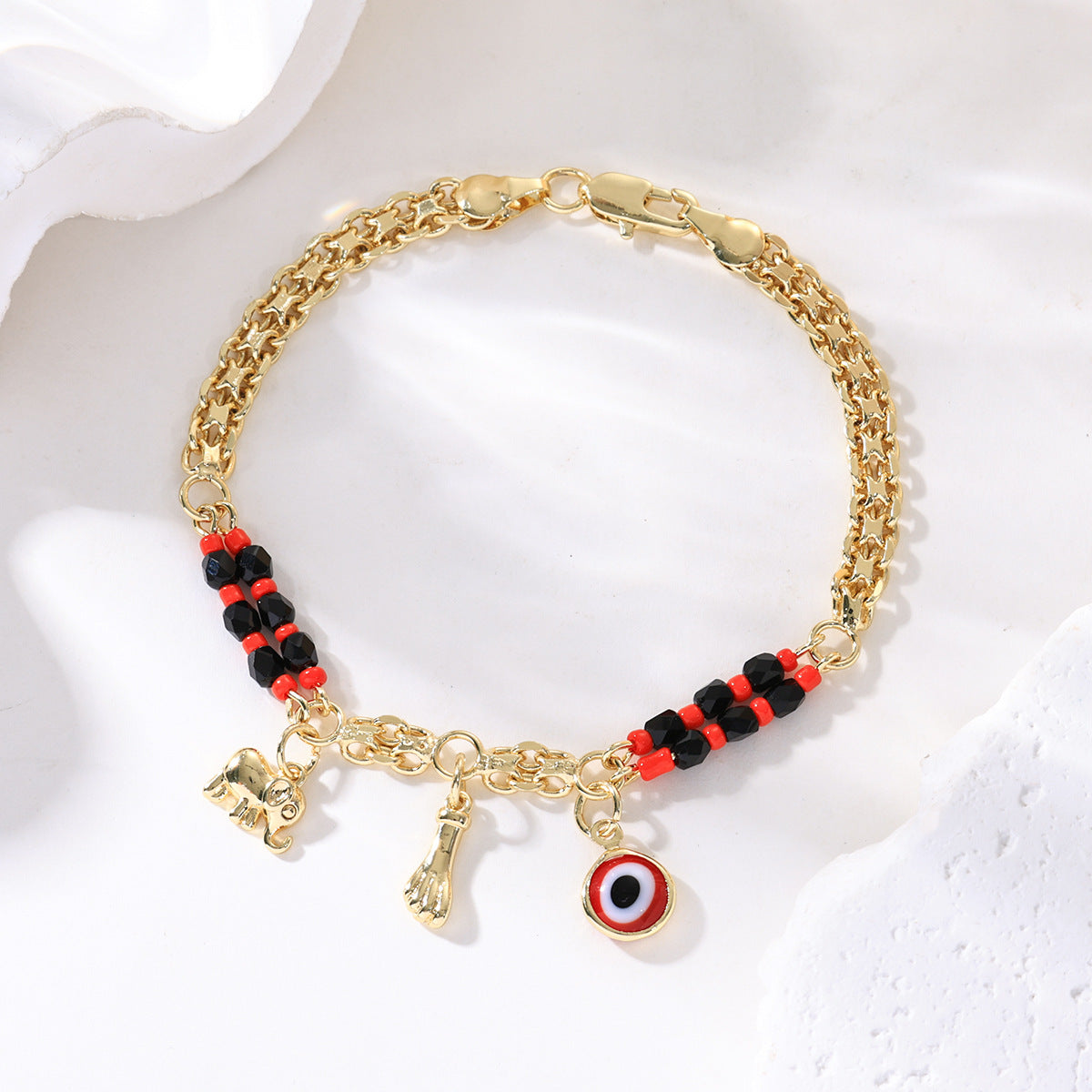 🔥【30% OFF】📿 ¡OFERTA POR TIEMPO LIMITADO CON UN 50% DE DESCUENTO! 🌀 Pulsera boho con amuletos y un elefante de la suerte: colgantes simbólicos, forma ajustable, baño de oro y 7 estilos ✨