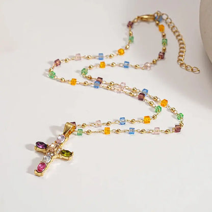 Oferta: Collar con cruz de circonitas de colores. Incluye un precioso joyero.